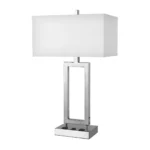 24.25"H Two light desk lamp with brushed nickel finish and two convenience outlets