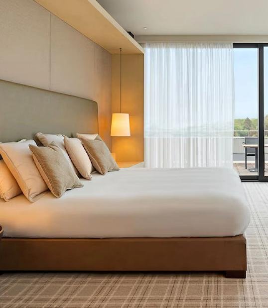 Hotel guest room bed with commercial mattress
